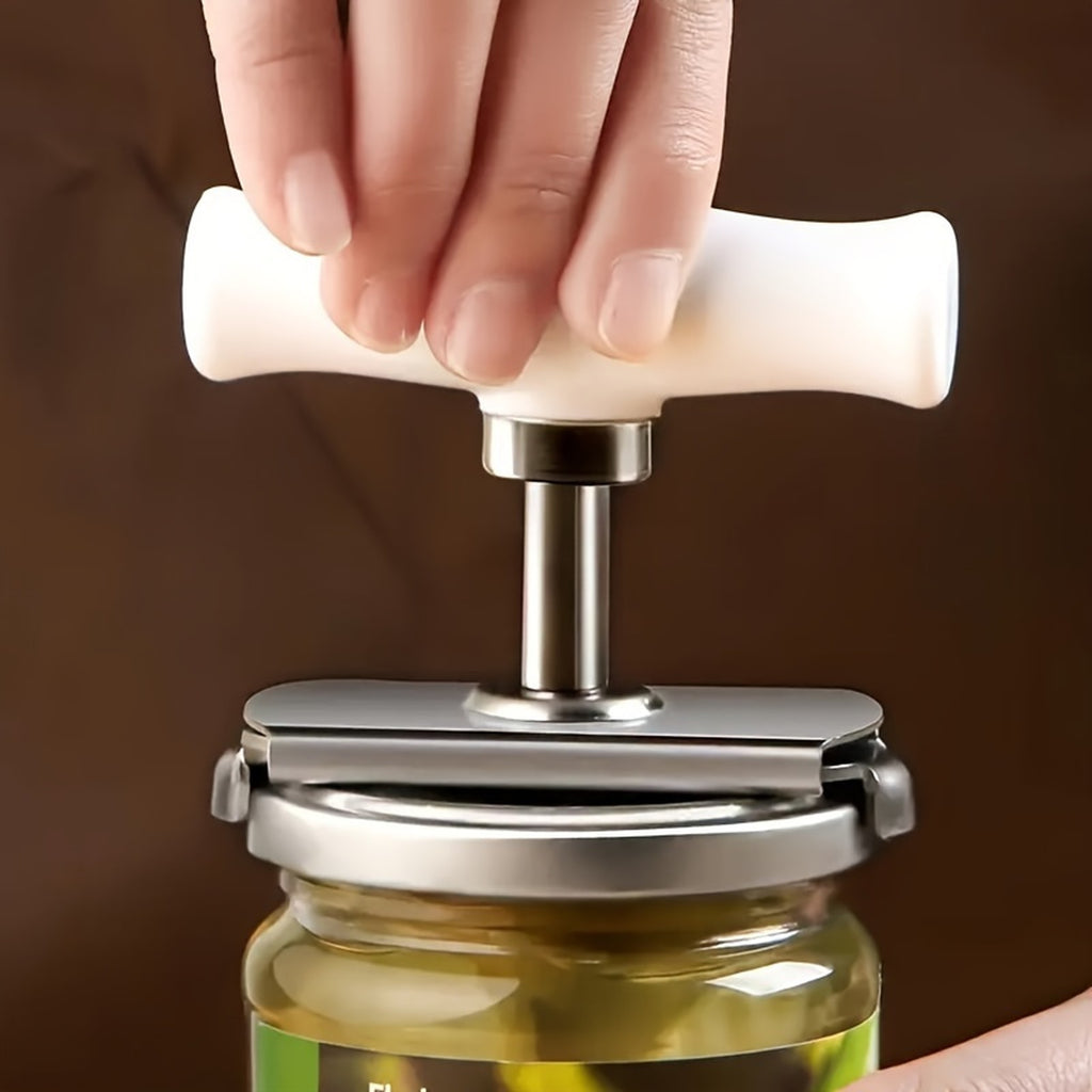 The jar opener clamped on a jar lid in a kitchen